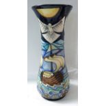 Moorcroft pottery 'Winds of Change' pattern slender baluster vase, tube lined decoration of doves