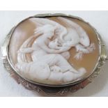 A cameo brooch depicting Classically draped woman and eagle with grasses in its claws, oval in