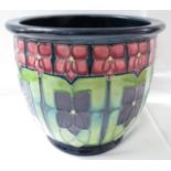 Moorcroft pottery planter, dark blue green with a repeating decoration in the Art Nouveau manner,