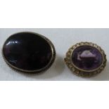 Two brooches - an oval amethyst brooch set within a halo of chip diamonds (overall 20mm x 16mm), and