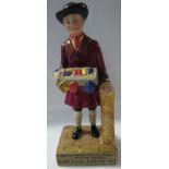 Wilkinson Ltd Clarice Cliff pottery figure of male street vendor with tray of wares, the base