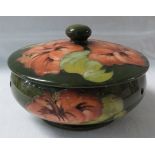 Moorcroft pottery pot pourri jar, green ground with pink hibiscus, stamped MOORCROFT and paper