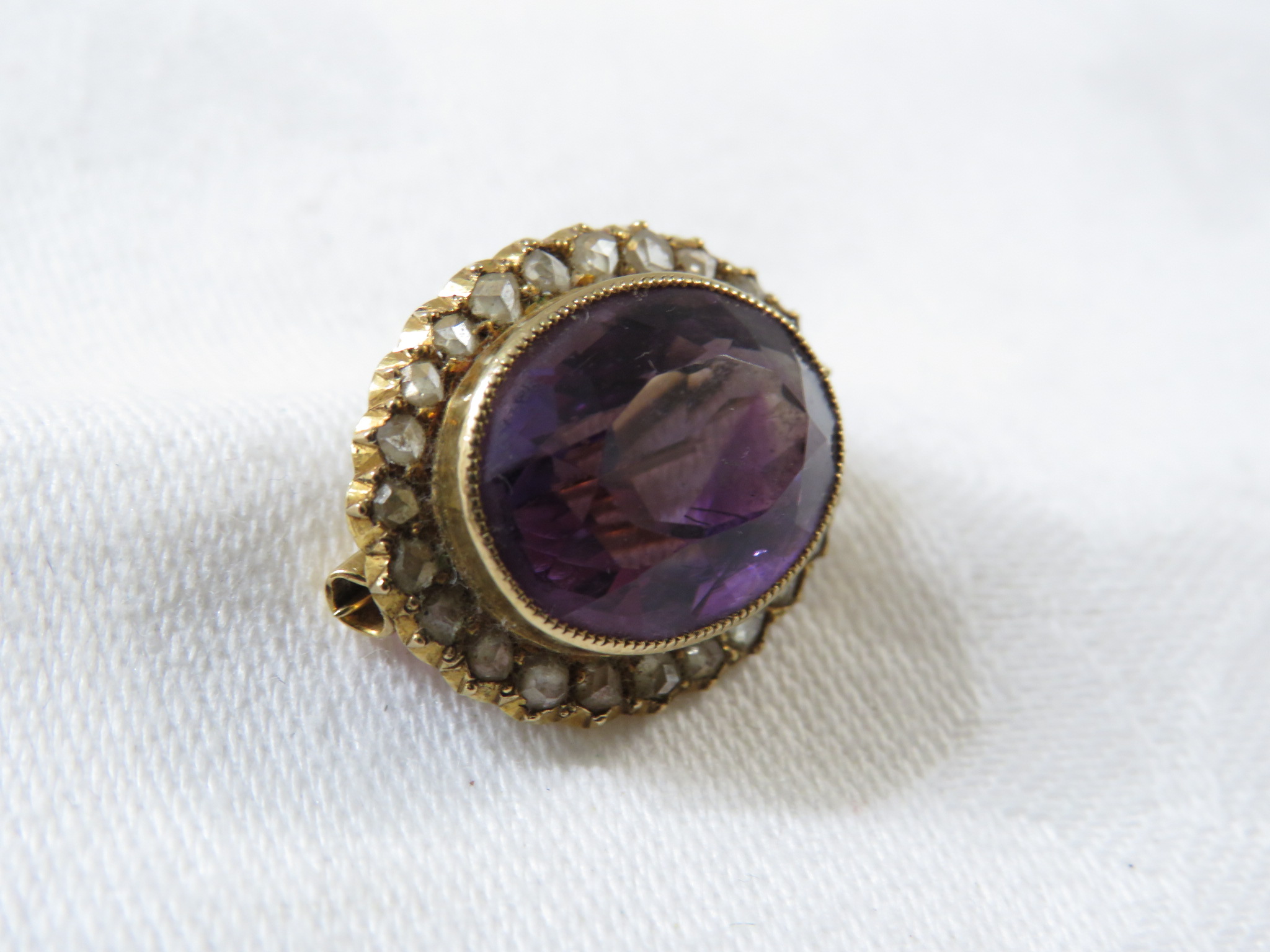 Two brooches - an oval amethyst brooch set within a halo of chip diamonds (overall 20mm x 16mm), and - Image 4 of 4