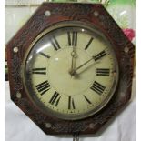 A Victorian eight day chain driven chiming wall clock with circular painted wooden Roman chapter