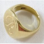 A yellow metal signet ring engraved with initial R, the shank stamped 18CT, 13g, ring size J for