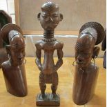 Pair of carved wood head and shoulder figures with metal wire earrings, each with typed label 'CONGO