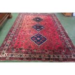 MODERN PERSIAN SHIRAZ STYLE CARPET, RED GROUND, THREE MEDALLIONS WITH STYLIZED BIRDS AND FLOWERS (