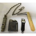 COMBO POCKET LIGHTER, METROPOLITAN POLICE WHISTLE ON CHAIN, CIGAR CUTTER AND BONE HANDLED PENKNIFE