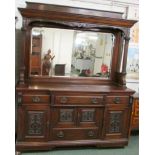 A late 19th / early 20th century large breakfront sideboard, the back panel with a single plain