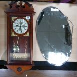 Mahogany reproduction William Drake wall clock and oval hanging mirror (2)