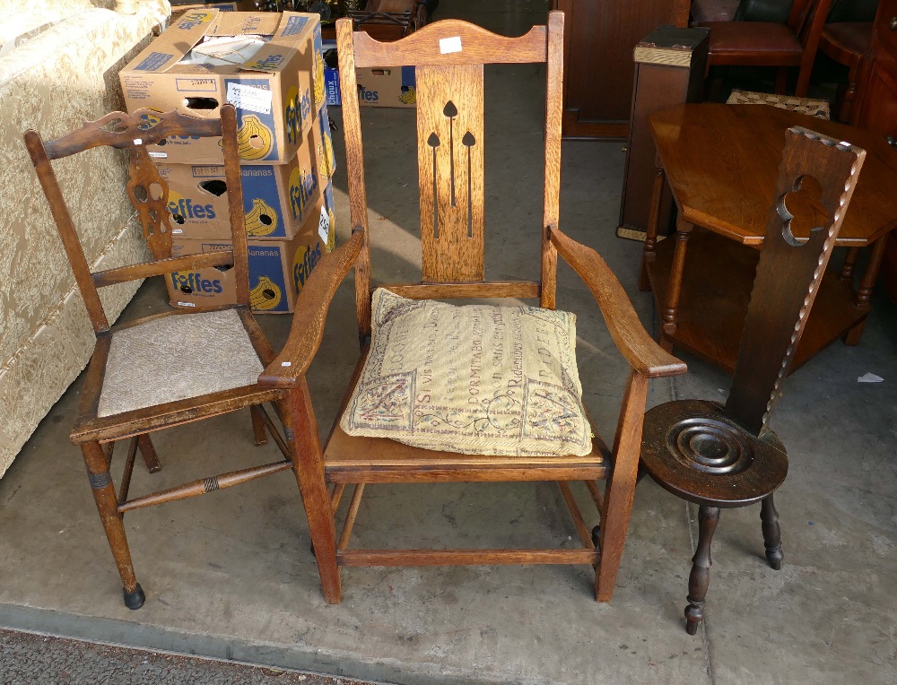 3 Oak chairs to include a carved hall chair,