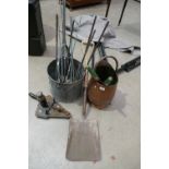 A collection of brass and metals items to include a metal planting bucket, coal bucket,