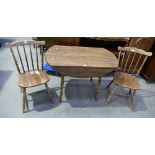 Drop leaf table with 2 matching spindle back chairs.