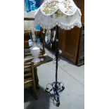 A metal Victorian style standard lamp and white table lamp (2)