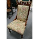 Edwardian upholstered carved walnut nursing chair