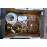 A mixed collection of items to include mid Century oak mantle clock together with brass paraffin
