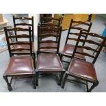 6 Oak ladder back chairs.