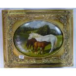 Reproduction primitive painting of horse and foal in heavy gilt frame.