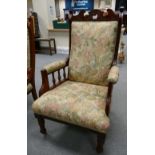 Edwardian upholstered carved walnut arm chair