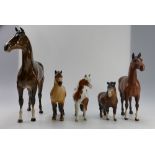 A collection of damaged Beswick horses to include Shetland pony 1033, Skewbald Pinto pony 1373,