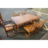 Oak refractory dinning table and 6 matching leather seated ladder back chairs including 2 carvers