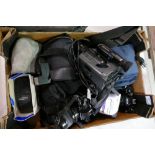 A collection of camera equipment to include, Minolta SLR camera, Ricoh KR10 camera,