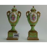 A pair of Noritake cabinet vases height 21cm (tiny nip to edge of lid) (2)