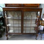 Oak display cabinet on cabriole legs and ball and claw feet