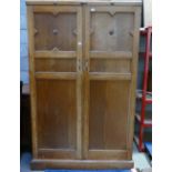 1920's light oak gentleman's compact wardrobe