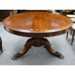 French carved walnut round tripod table