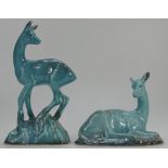 Beswick blue glazed model of doe on base 696 and seated deer on base.