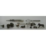 A collection of silver and silver plated small figures of horse,