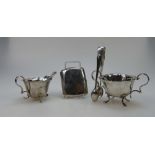 A collection of hall marked silver items including two handled sugar and cream jug,