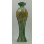 Lise Moorcroft green and yellow vase sprayed ground with hyacinth. From 1988. 37cm High.