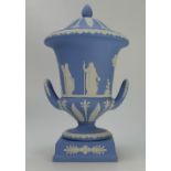 Wedgwood light blue jasper ware two handled urn and cover decorated with classical scene,