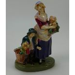 Royal Doulton figure London Cry HN749, lady and boy selling carrots.