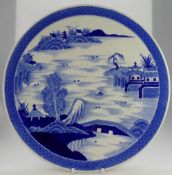 Chinese early export large blue & white charger, decorated with pagoda, mountains, lakes,