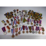 A large collection of various WWI & WW2 medals including quantities of Victory & Civilisation,