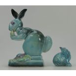 Beswick blue glazed model of rabbit eating on base 316 and small seated rabbit scratching 824.