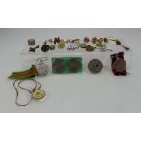 A pair of medals Victory and The Defence medals and a collection of various military buttons,