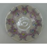 Lise Moorcroft hand thrown bowl with crackle glaze with pale violets. From 2003. 22cm High.