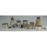 A collection of Silver items including serviette rings, spoons,