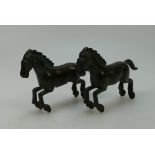 Pair bronze abstract models of rearing horses,