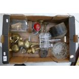 A mixed collection of metalware items to include butter churner, decorative brass coffee pots,