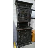 19th Century carved dark oak cupboard with stained glass door