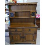 Carved Oak Dresser with leaded glass