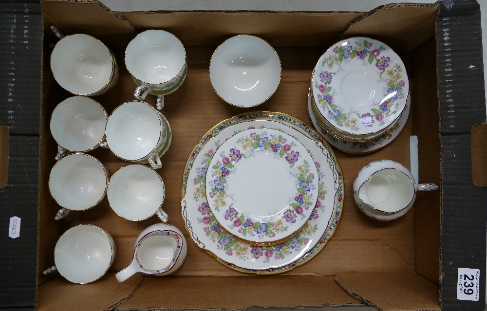 A large collection of Coalport tea ware in the Maytime Design to include cups, saucers, side plates,