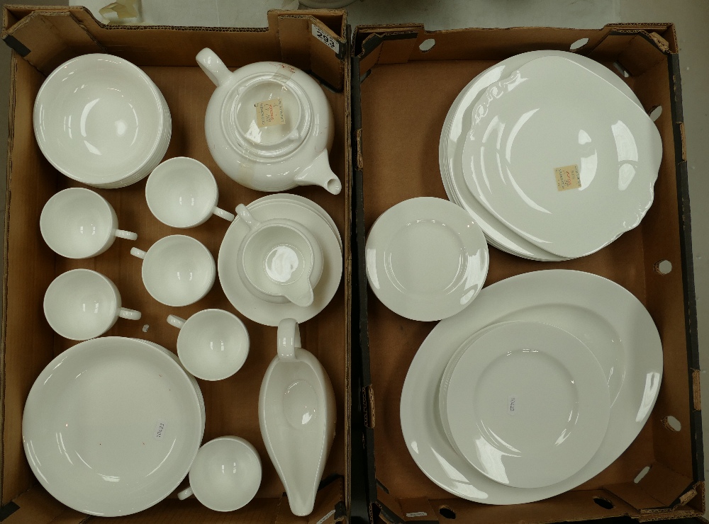 A large collection of Wedgwood undecorated tea and dinner ware to include plates, tea pot,