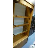 Large 4-tier display cabinet with illuminating glass shelving and lockable storage cabinet to