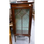 Inlaid mahogany slim display cabinet with glass slides and shelves, with key.